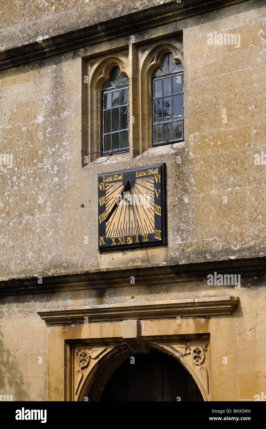 Sundial over the south door of St. Lawrence`s Church, Mickleton, Gloucestershire, England, UK Stock Photo